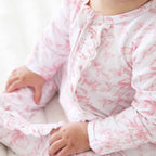 Bamboo-Spandex Pink Toile Ruffle Zipper Footie with Grips